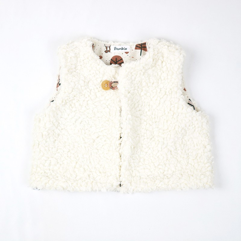 Gilet de berger en coton biologique du 3 au 24 mois, création originale. Gilet de berger en coton biologique du 3 au 24 mois, création originale.