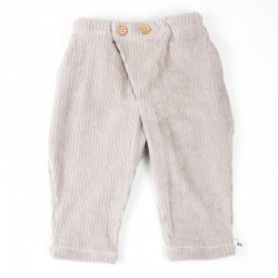 Coton bio et coupe originale pour ce petit pantalon mixte velours beige, de 3 à 24 mois.