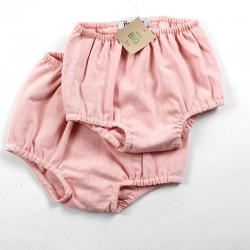 Idée cadeau de naissance pour ce bloomer cache couche rose façon layette nature