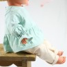 Tunique bébé création couture  en lange menthe certifié GOTS de fabrication artisanale et soignée.