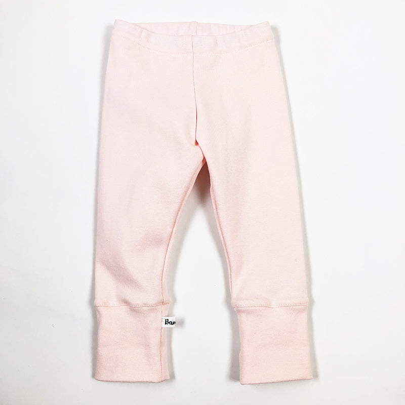 Pantalon souple pour petite fille en coton biologique rose pâle
