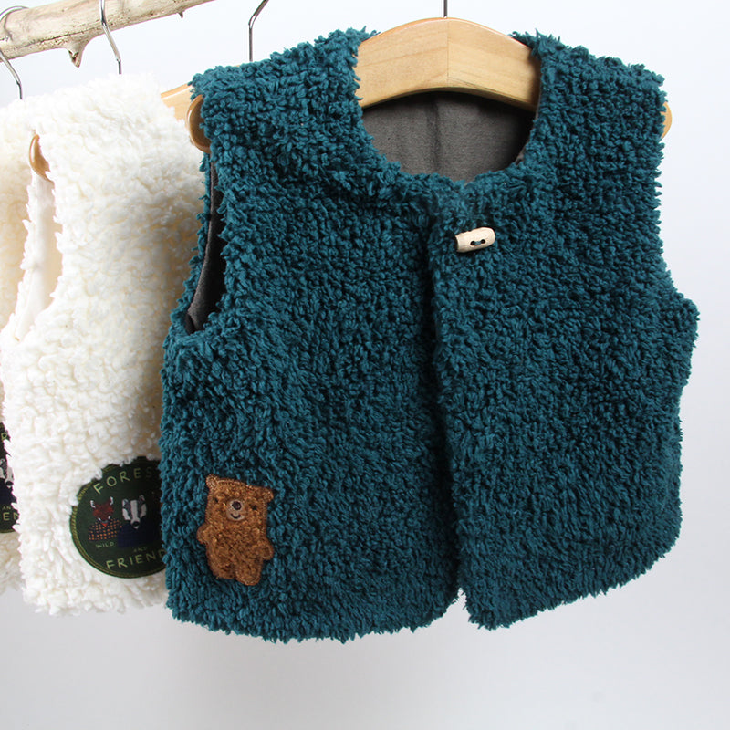 Haut hiver bébé avec écussons, en fourrure bio