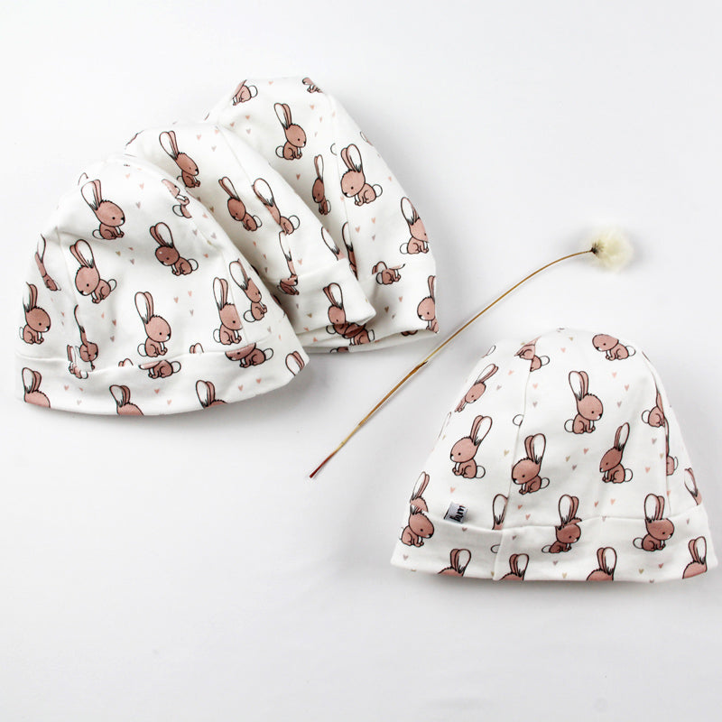 Bonnets lapins rose beige doublés, confortables et doux. 